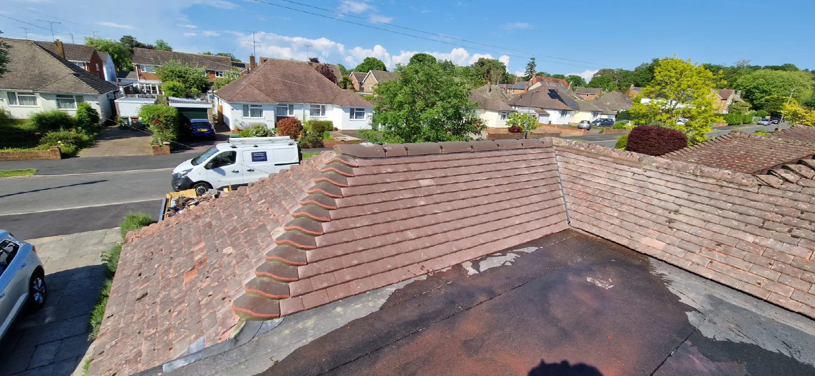 Tiled roof works connecting the extension to the existing property